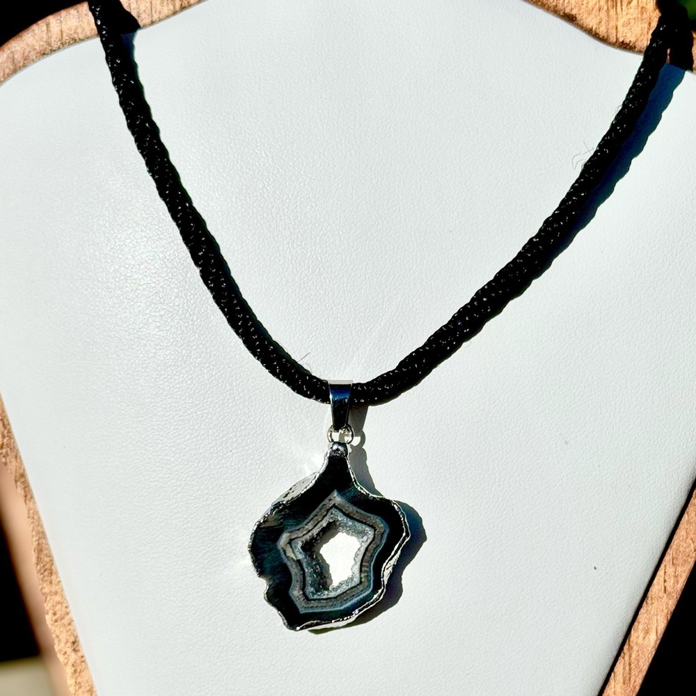 Elegant Black and Silver Hollow Geode Pendant Necklace.
